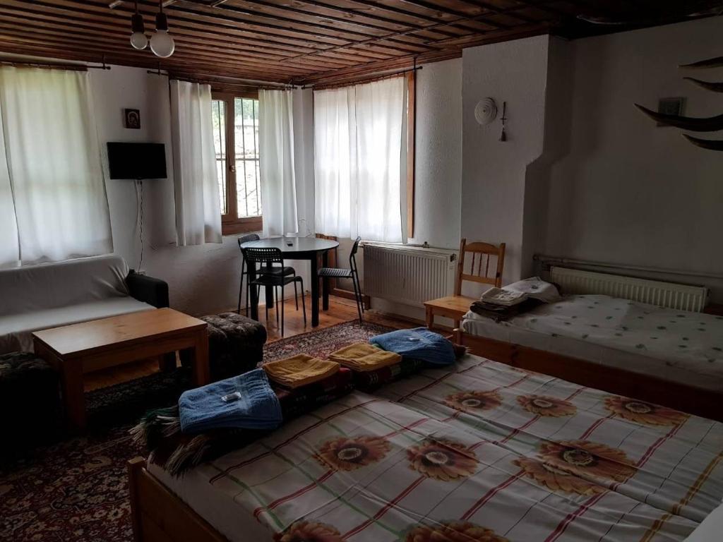 Postel nebo postele na pokoji v ubytování Borimechkova Kashta