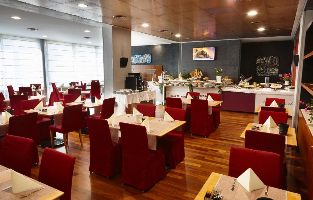 TV a/nebo společenská místnost v ubytování Vicenza Tiepolo Hotel