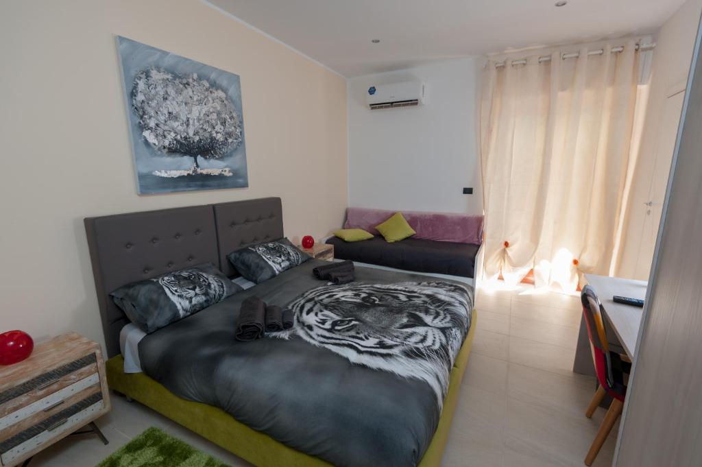 Postel nebo postele na pokoji v ubytování B&B Epipoli