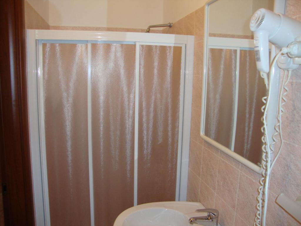 Koupelna v ubytování Albergo Gino