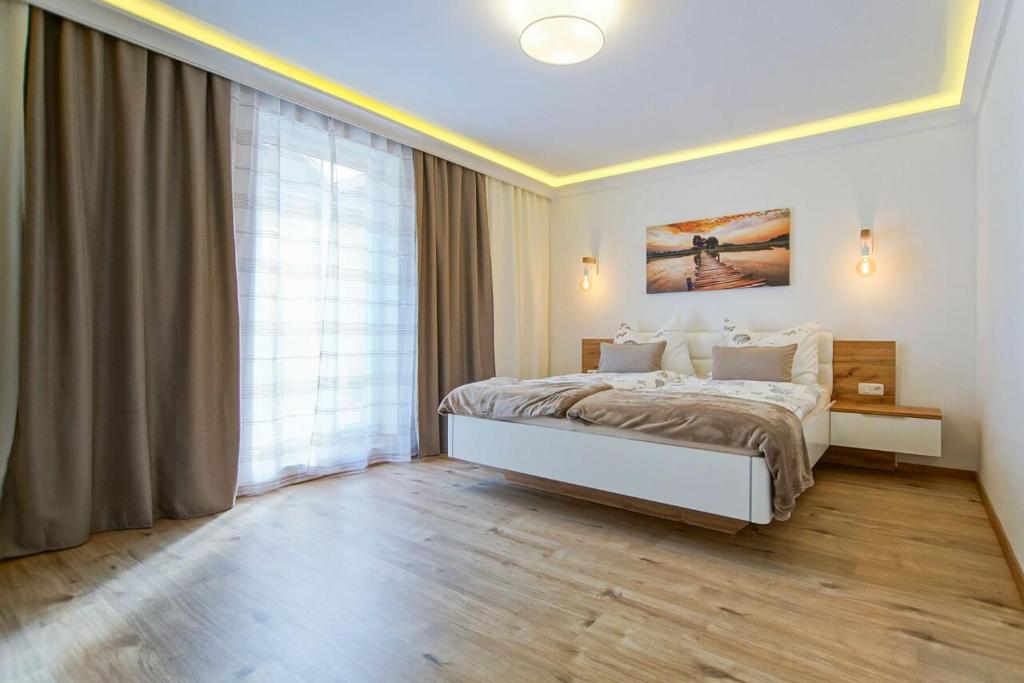 Postel nebo postele na pokoji v ubytování AusZeit Leoben 1 mit Terasse und gratis Parkplatz