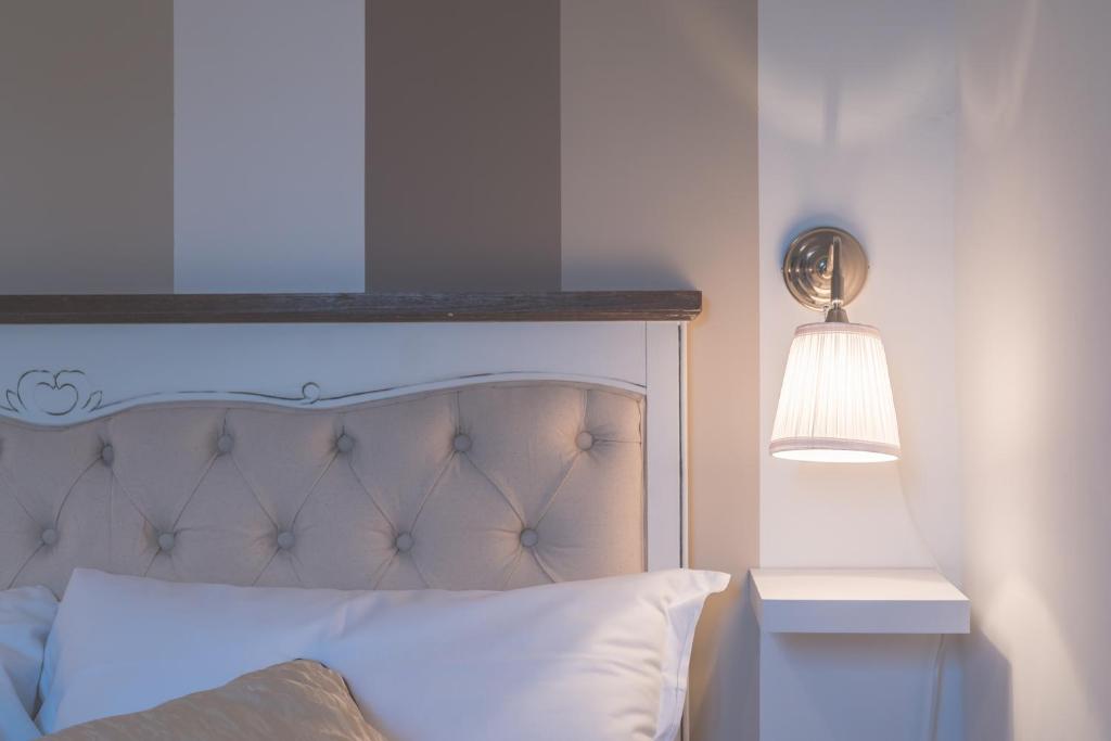 Łóżko lub łóżka w pokoju w obiekcie Pellegrino 75 Double Bedroom