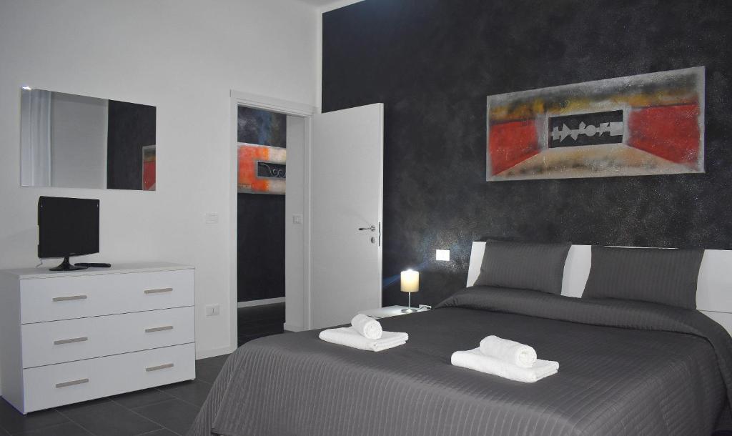 Voodi või voodid majutusasutuse Red & Blu Apartments toas