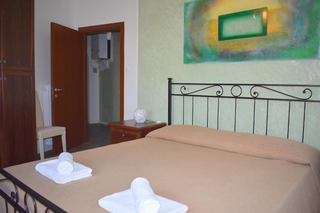 Voodi või voodid majutusasutuse Red & Blu Apartments toas