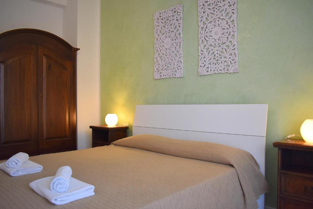 Voodi või voodid majutusasutuse Red & Blu Apartments toas