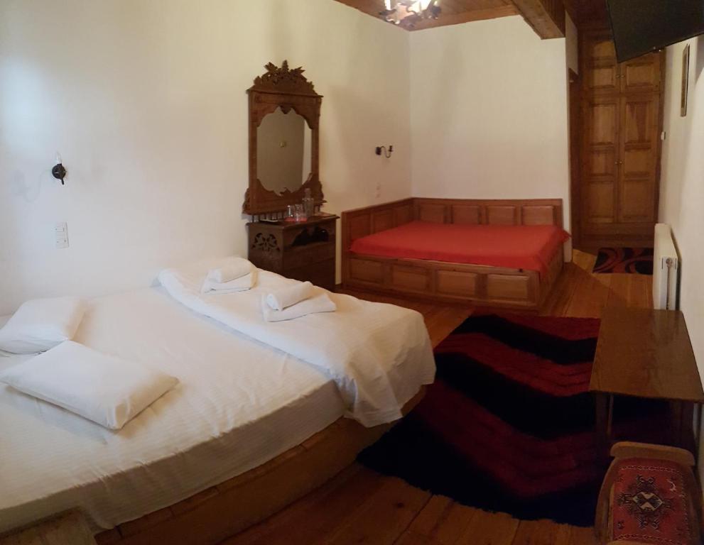 Postel nebo postele na pokoji v ubytování Kalliopi