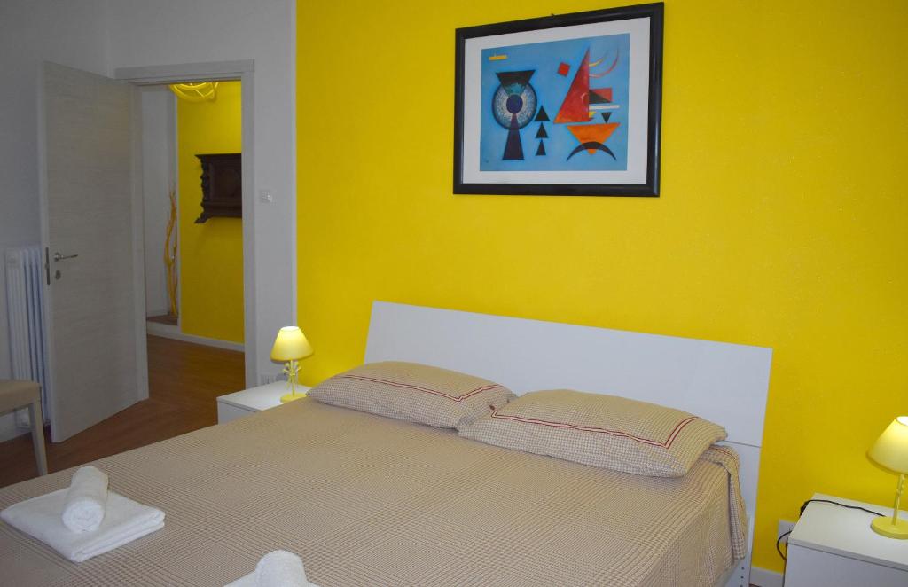 Voodi või voodid majutusasutuse Red & Blu Apartments toas