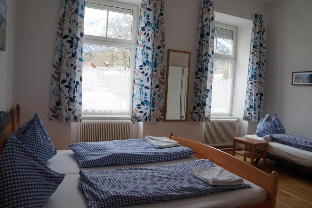 Postel nebo postele na pokoji v ubytování Luise Wehrenfennig & Haus EvA