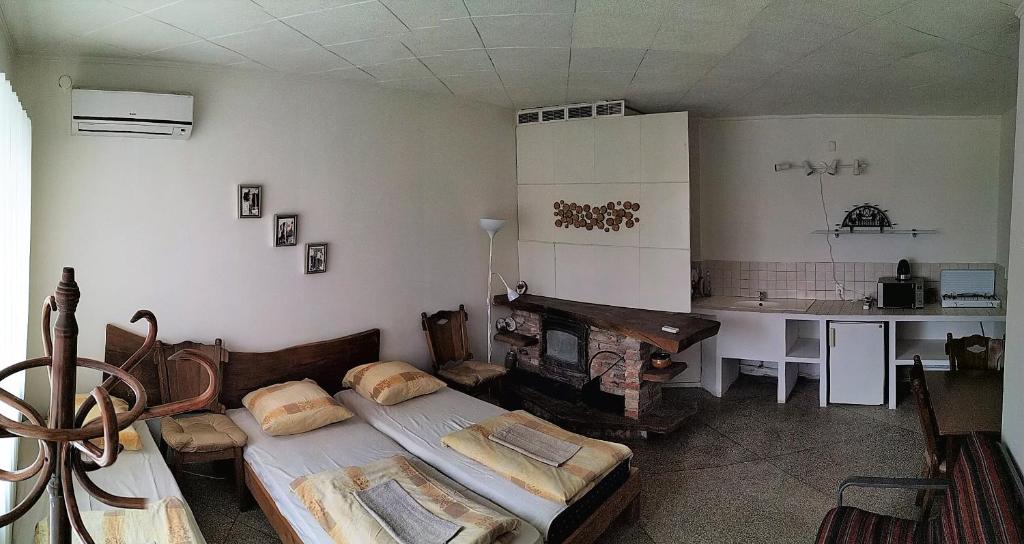 Postel nebo postele na pokoji v ubytování Jurgis Guest house