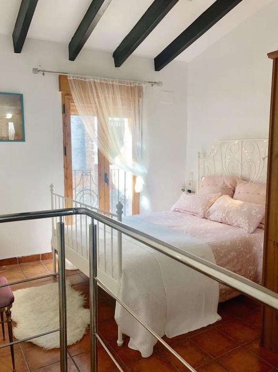 Postel nebo postele na pokoji v ubytování Preciosa villa en el corazón de Gandia