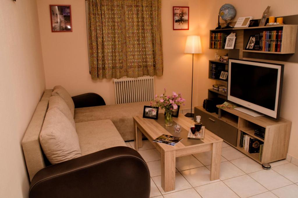 TV a/nebo společenská místnost v ubytování Amalias Place