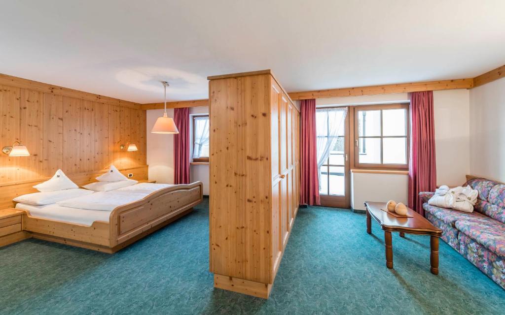 Postel nebo postele na pokoji v ubytování Hotel Peter