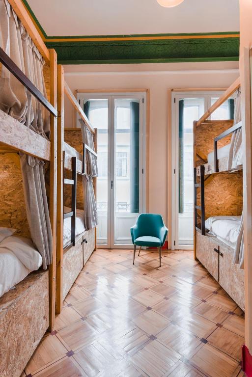 Postel nebo postele na pokoji v ubytování Hostal R10