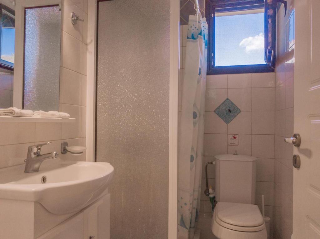 A bathroom at Kounopetra Beach Luxury Villas