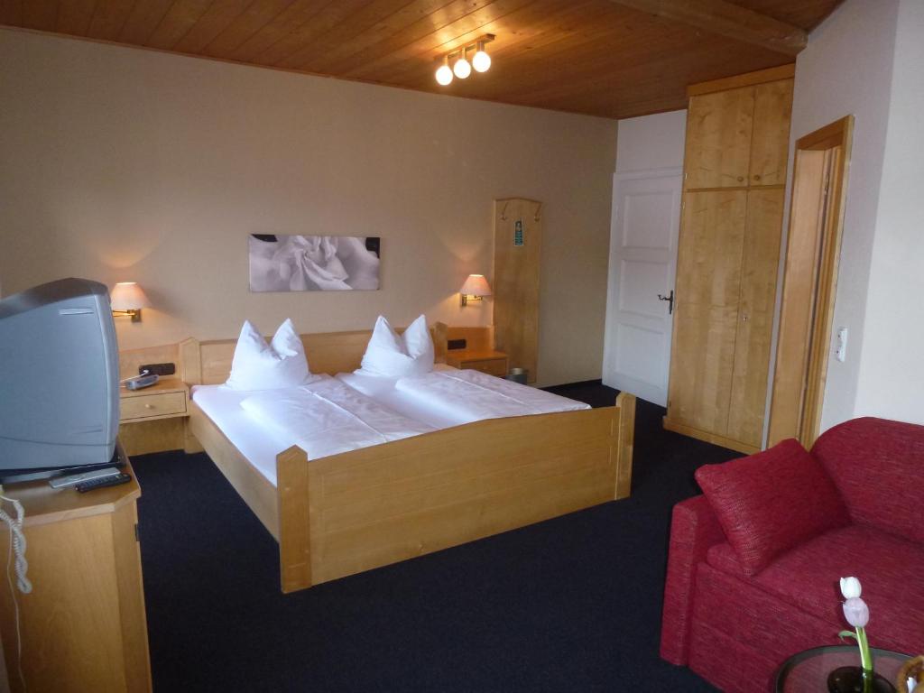 Postel nebo postele na pokoji v ubytování Alpenhof Landhotel Restaurant