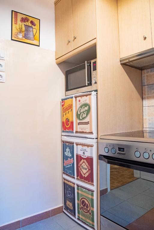 Kuchyňa alebo kuchynka v ubytovaní Fix Divine Apartment