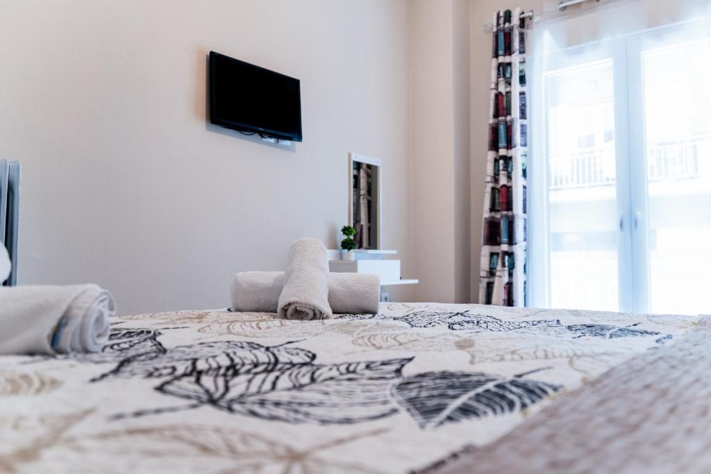 Posteľ alebo postele v izbe v ubytovaní Fix Divine Apartment