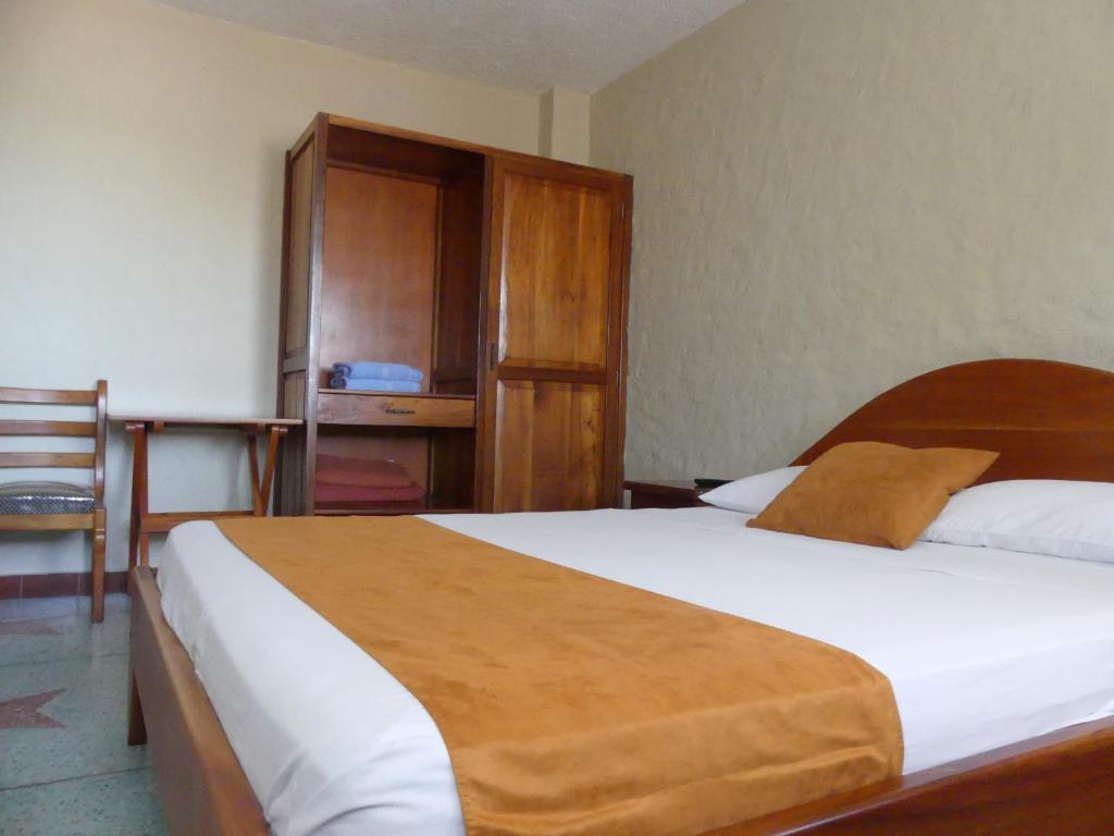 Postel nebo postele na pokoji v ubytování Hostal Estrella de Mar