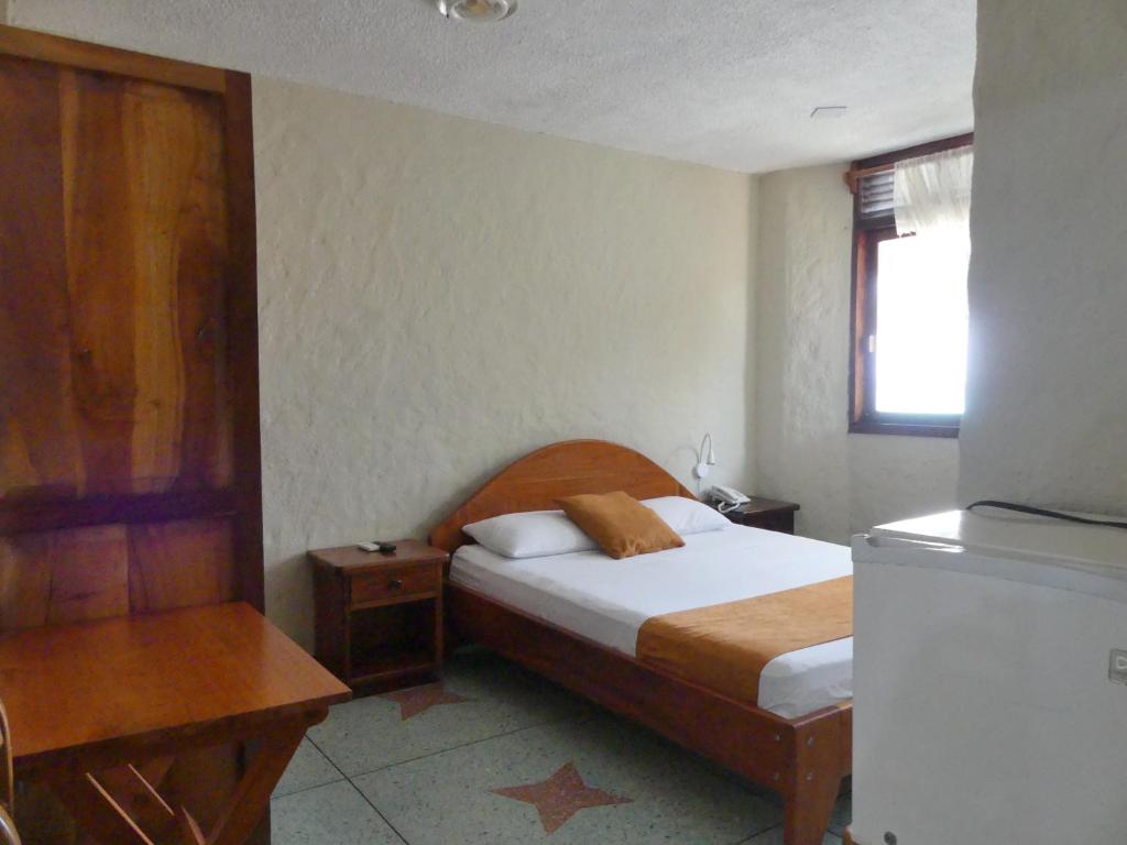 Postel nebo postele na pokoji v ubytování Hostal Estrella de Mar