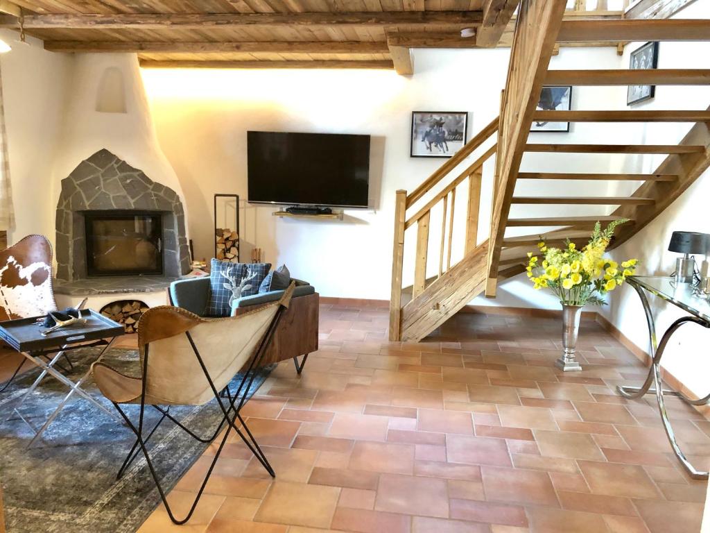 TV a/nebo společenská místnost v ubytování CHALET BELLE KAISER by Belle Stay