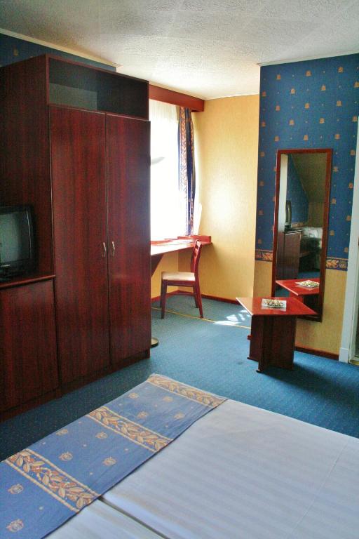 Voodi või voodid majutusasutuse Classic Hotel toas
