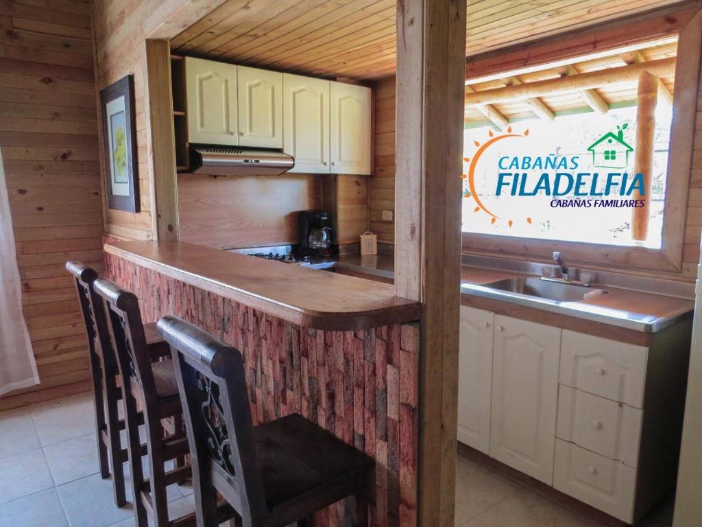 Una cocina o zona de cocina en Cabañas Filadelfia