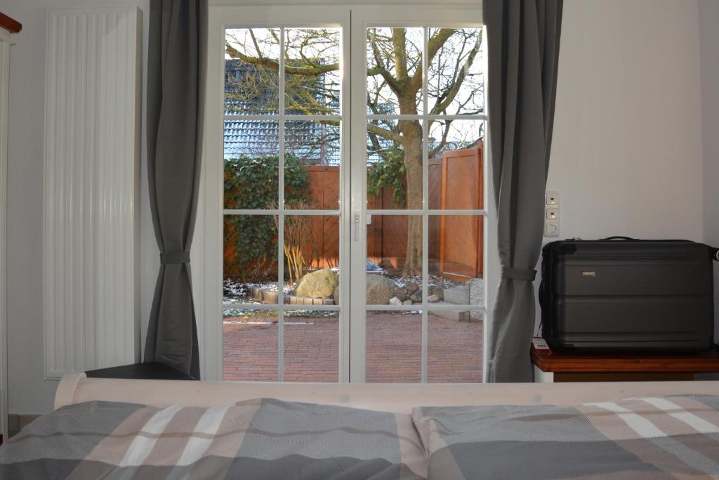 Letto o letti in una camera di MOIN, MOIN & AHOI!