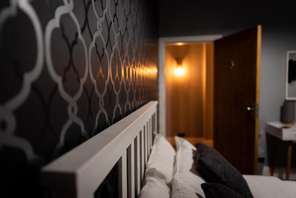 Postel nebo postele na pokoji v ubytování REM Hotel