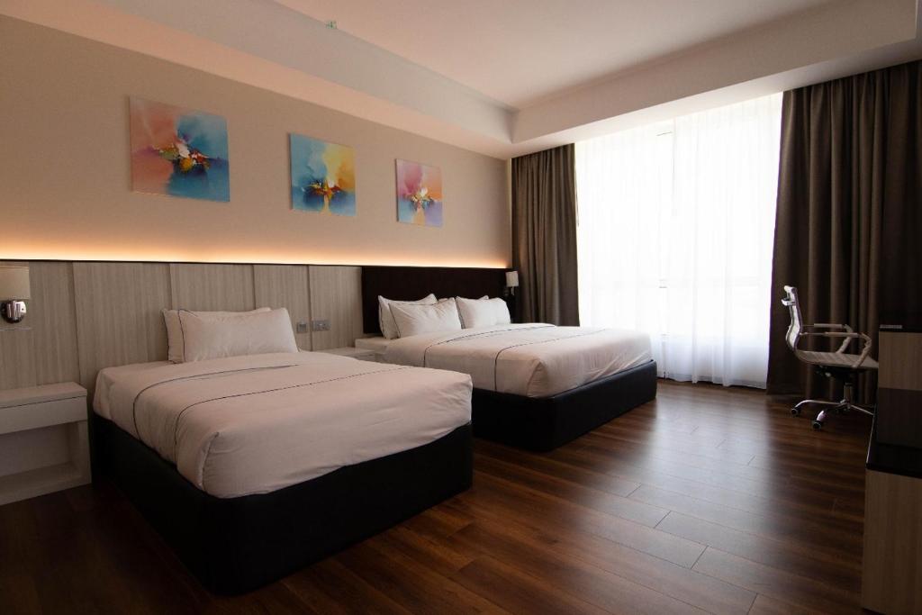 Postel nebo postele na pokoji v ubytování Higher Hotel