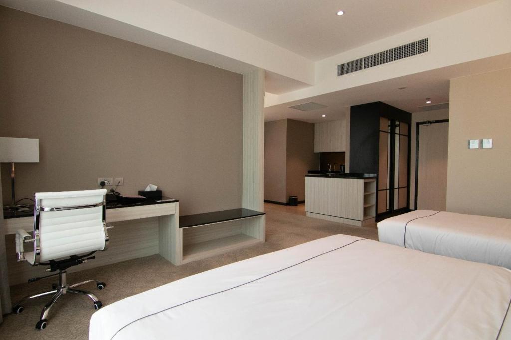 Postel nebo postele na pokoji v ubytování Higher Hotel