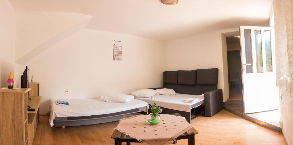 Postel nebo postele na pokoji v ubytování Apartments Milinkovic