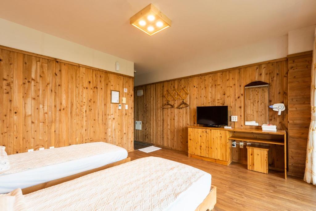 Postel nebo postele na pokoji v ubytování Galeum Guesthouse