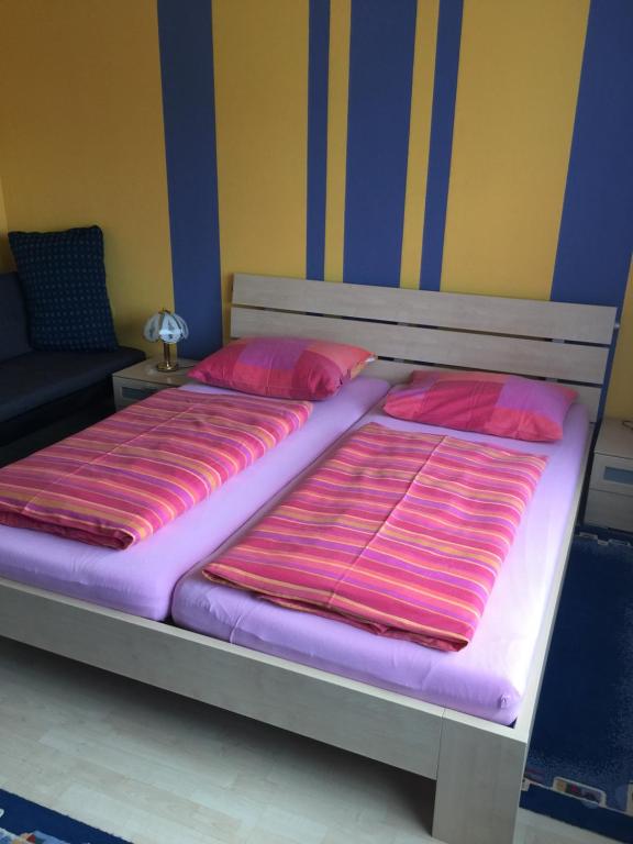 Postel nebo postele na pokoji v ubytování Gästehaus Maria