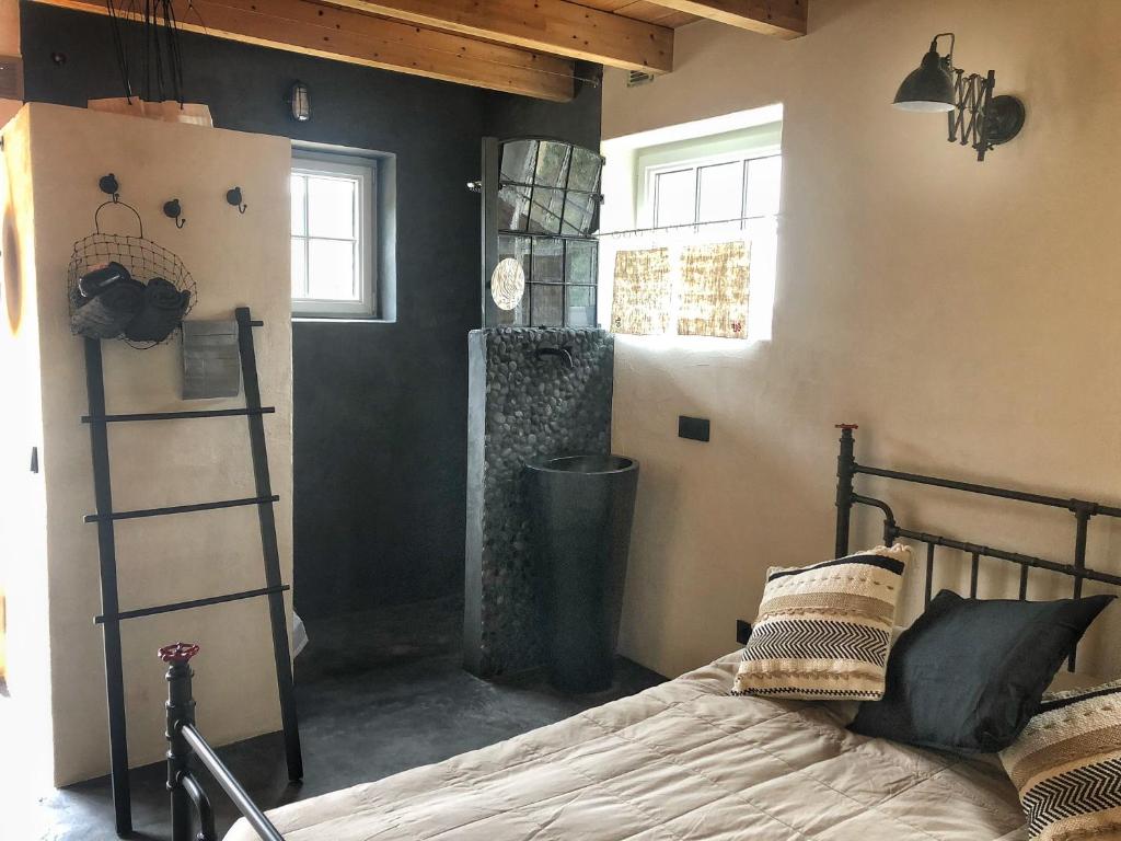 Ein Bett oder Betten in einem Zimmer der Unterkunft Cottage House Weyer - Mare&Filly Room