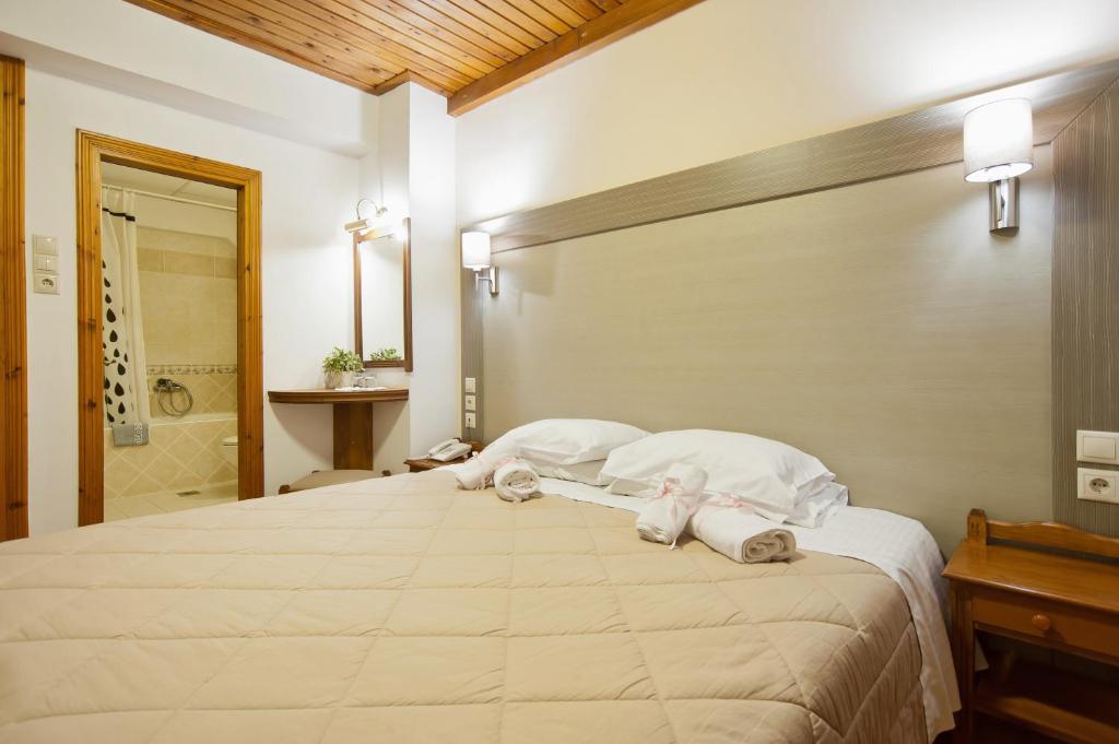Krevet ili kreveti u jedinici u okviru objekta Pan Hotel