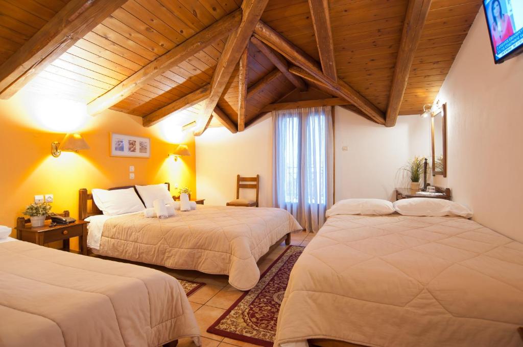 Krevet ili kreveti u jedinici u okviru objekta Pan Hotel