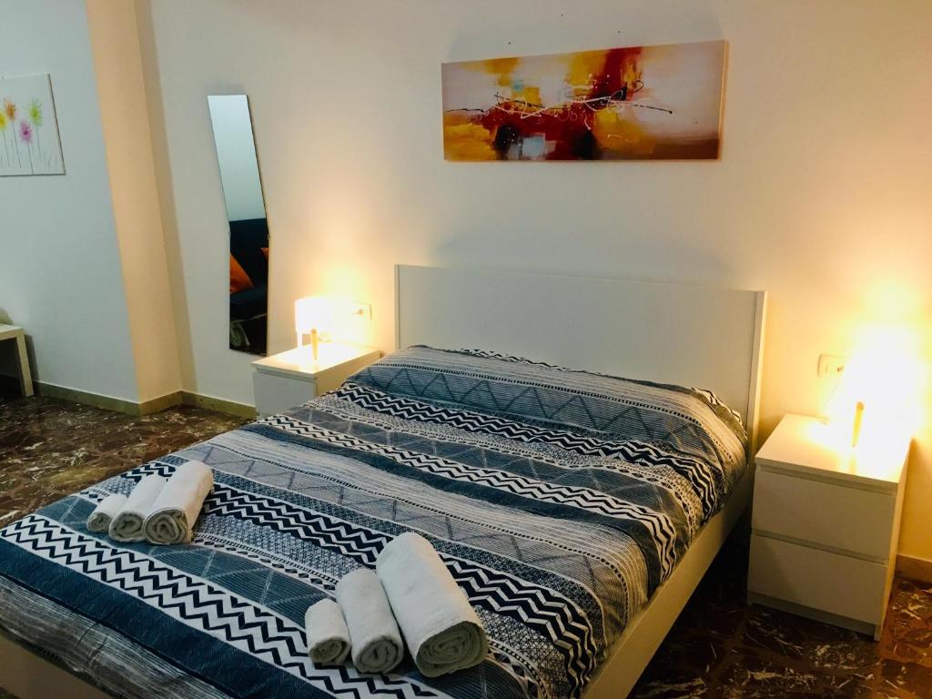 Postel nebo postele na pokoji v ubytování Vittoria Colonna