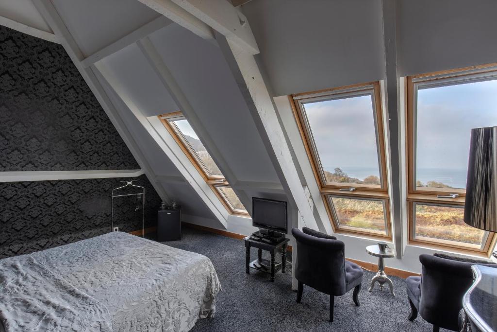 Cama ou camas em um quarto em Domaine du Grand Bec