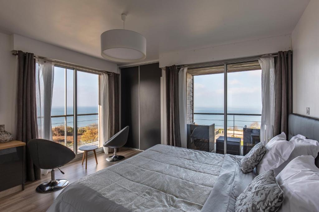 Cama ou camas em um quarto em Domaine du Grand Bec