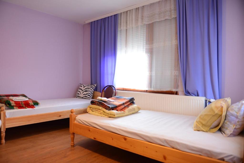 Postel nebo postele na pokoji v ubytování Delieva House