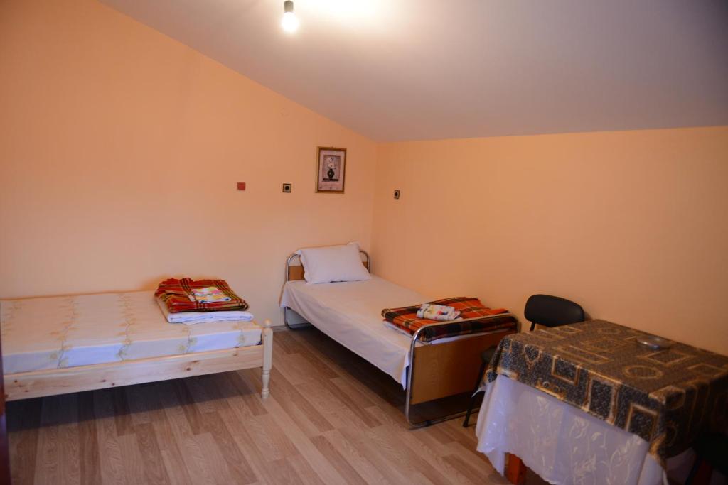 Postel nebo postele na pokoji v ubytování Delieva House