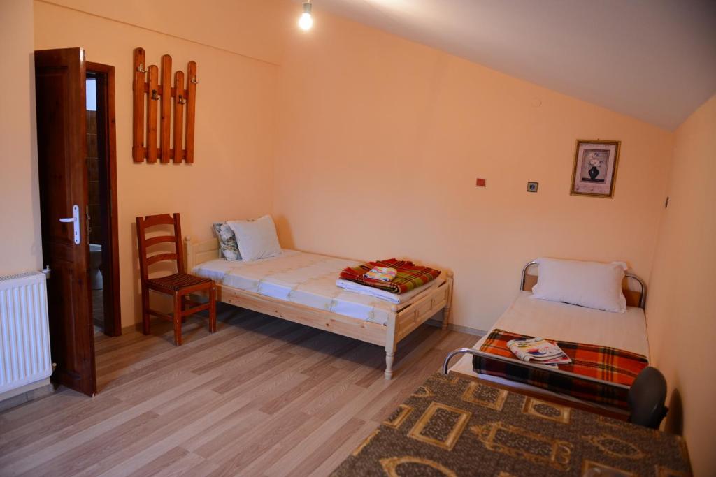 Postel nebo postele na pokoji v ubytování Delieva House