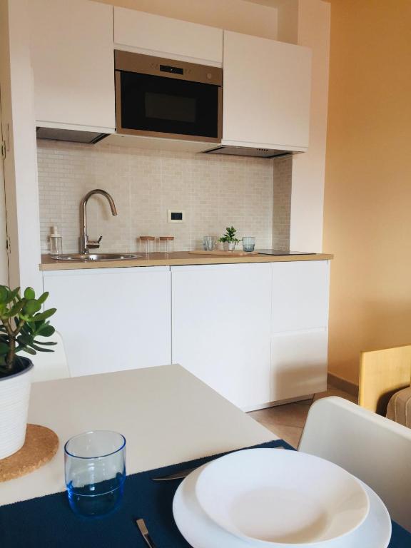 Kuchyň nebo kuchyňský kout v ubytování Torre Archirafi Vacanze