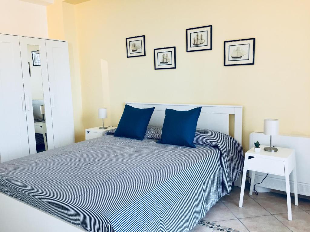 Postel nebo postele na pokoji v ubytování Torre Archirafi Vacanze