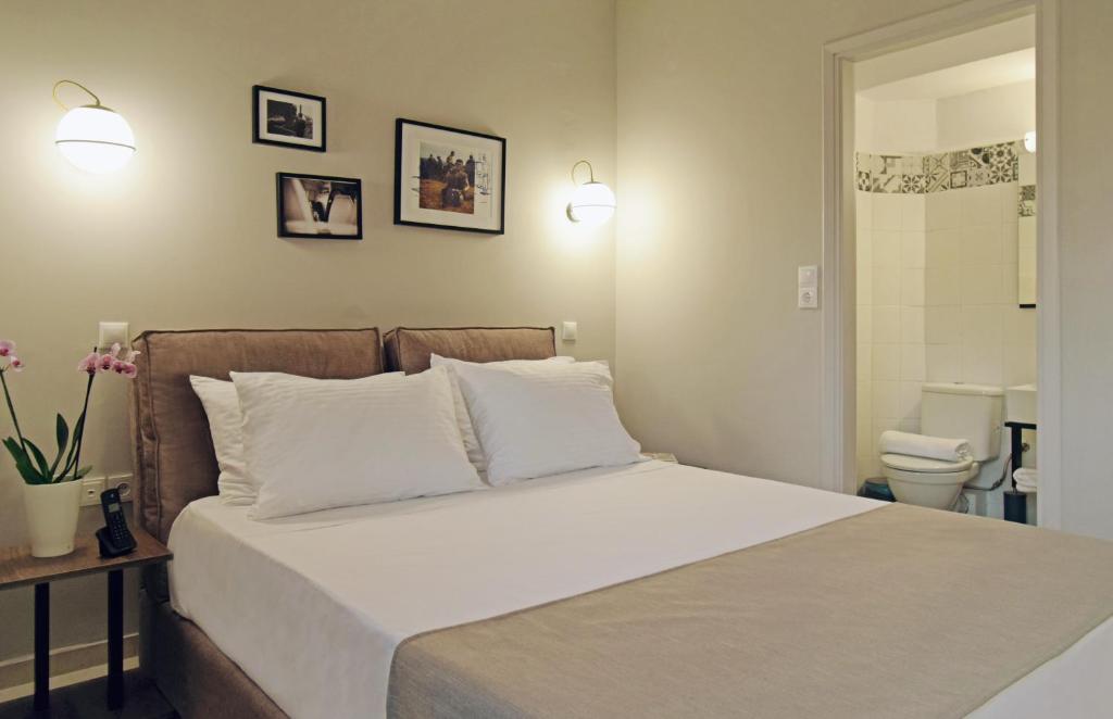 Athens Iris Hotel客房内的一张或多张床位