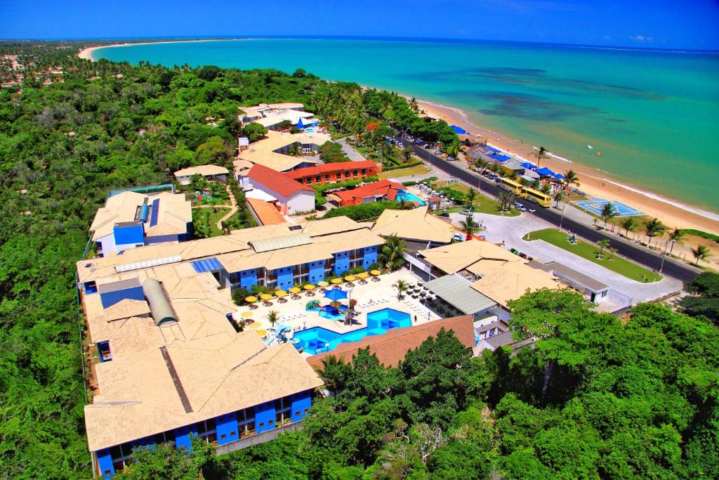 an aerial view of a resort on the beach at Hotel Brisa da Praia in Porto Seguro