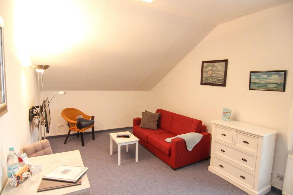 Χώρος καθιστικού στο Kapitaenshaus-Lassen-Zimmer-Blanker-Hans