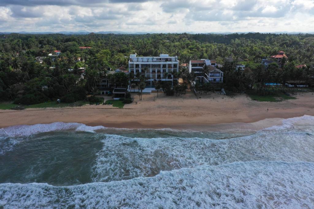 an aerial view of the beach and the ocean at Riff Hikkaduwa in Hikkaduwa