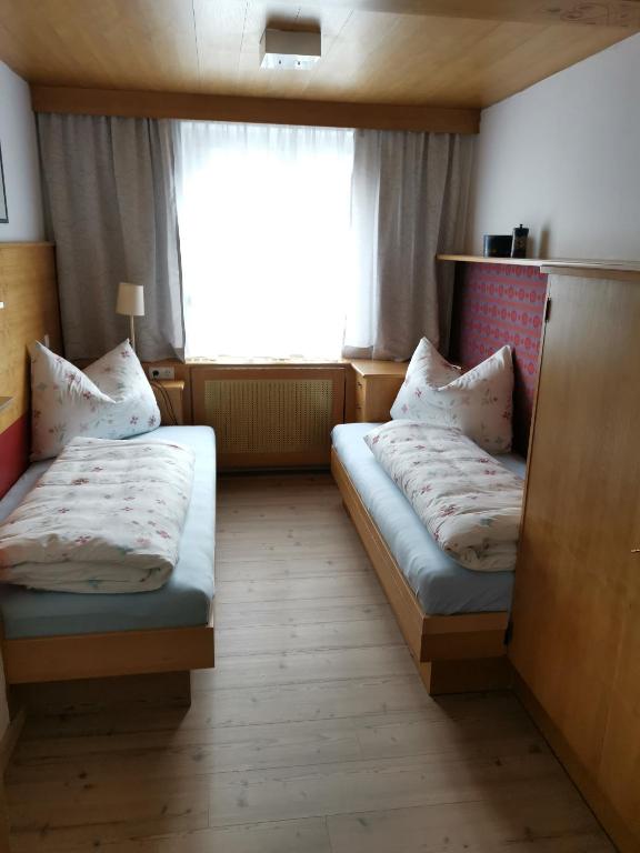 Postel nebo postele na pokoji v ubytování Haus Pierzinger