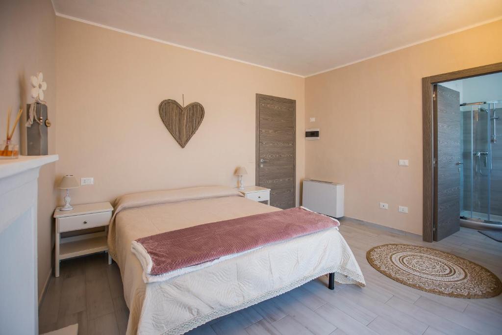 Postel nebo postele na pokoji v ubytování 700enolocanda